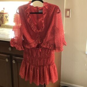 Jr’s size Large red print dress with Peek a Boo tummy